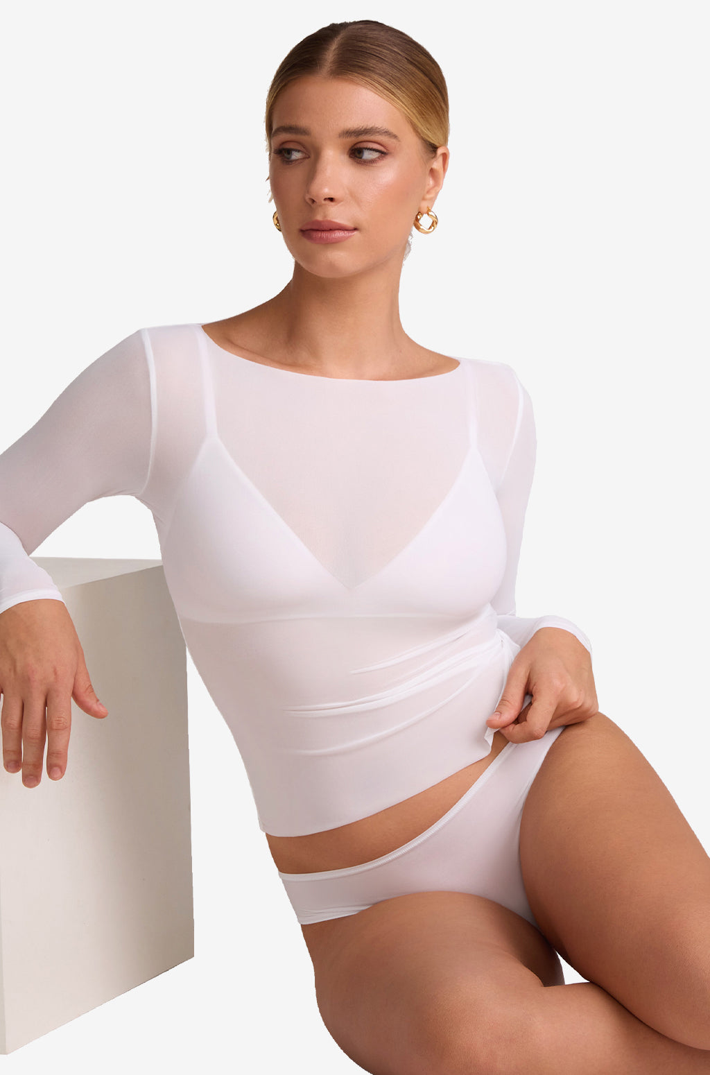 Top de malla manga larga cuello barco