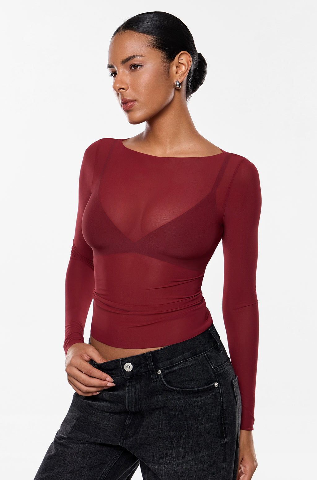 Top de malla manga larga cuello barco